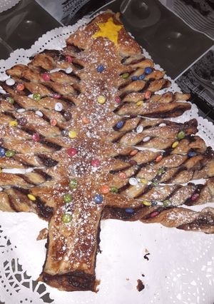 Una foto de Sapin de Noël (árbol de Navidad)
