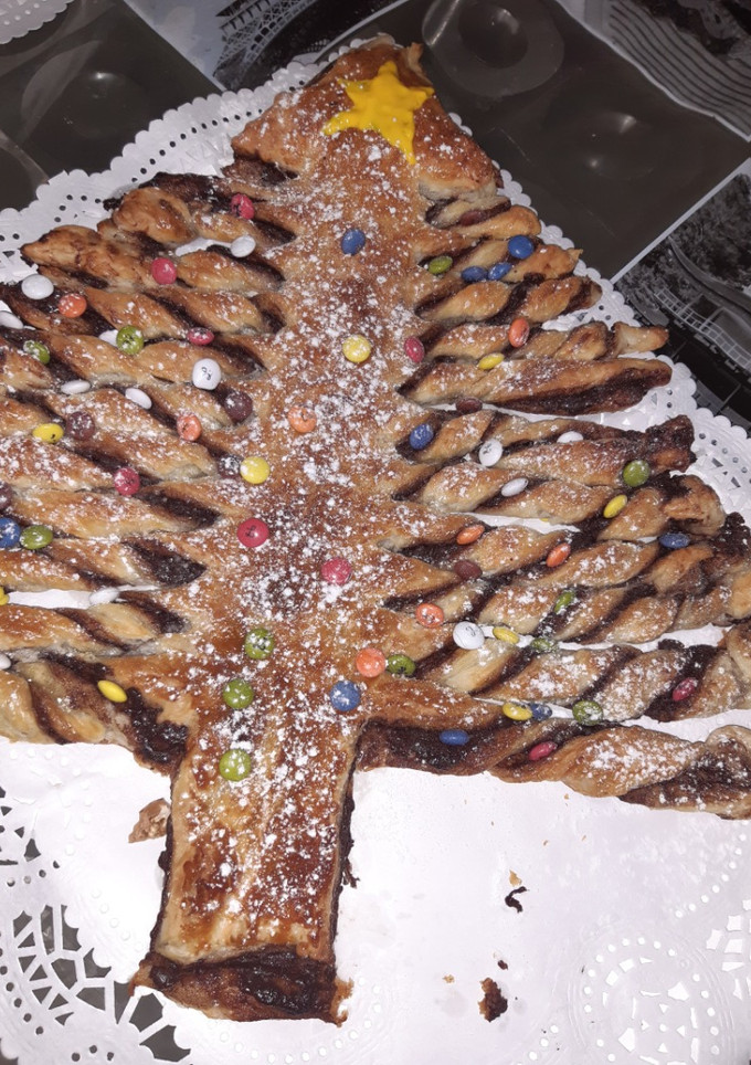 Una foto de Sapin de Noël (árbol de Navidad)