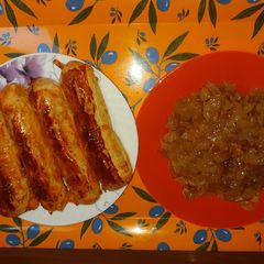 Puff pastry hot dogs with caramelized onions A picture of Puff pastry hot dogs with caramelized onions.