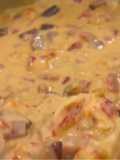 Homemade Queso with crawfish and andouille sausage