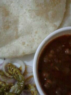 A picture of Homemade chhole bhatoore.