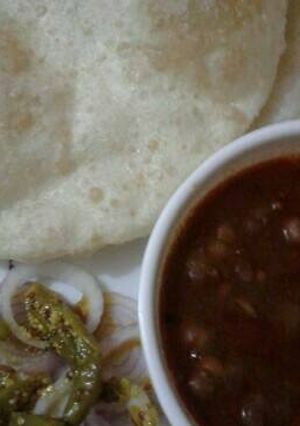 A picture of Homemade chhole bhatoore.