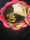 Fry achari mirchay with paratha