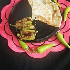 Fry achari mirchay with paratha A picture of Fry achari mirchay with paratha.