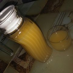 A picture of Orange and ginger juice.