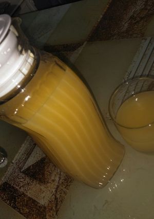 A picture of Orange and ginger juice.