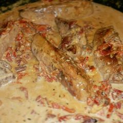 A picture of Chicken breasts in Sun dried tomato cream sauce.