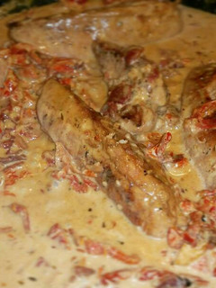 A picture of Chicken breasts in Sun dried tomato cream sauce.