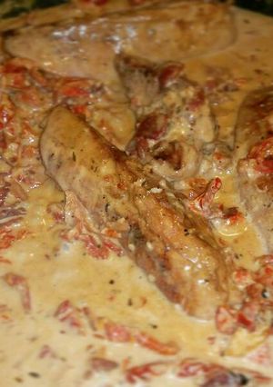A picture of Chicken breasts in Sun dried tomato cream sauce.