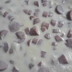 Una foto de Crema con salchichas