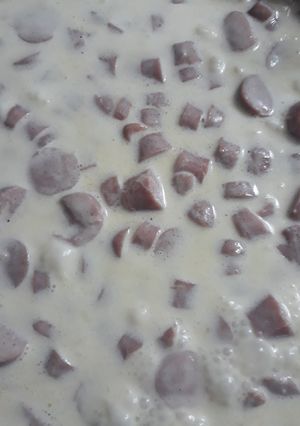 Una foto de Crema con salchichas