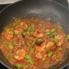 A picture of Stir-fried Stink bean with shrimp paste, fresh shrimp and minced pork.