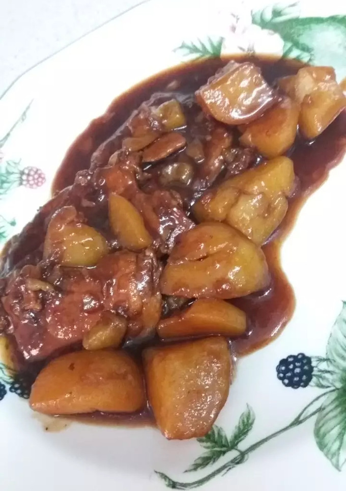Una foto de Lomo con patatas a la cocacola