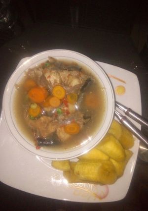 A picture of Fresh cat fish peppersoup with boiled plaintain.