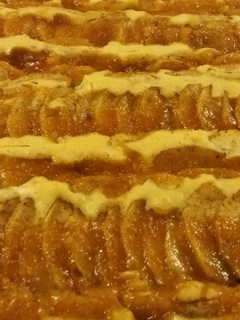 Una foto de Kuchen de manzana en lata de horno