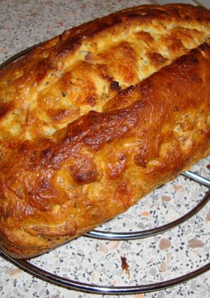 Une photo de Cake salé au chèvre, lardons et basilic