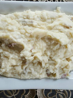 Una foto de Puré de papas moradas con mantequilla