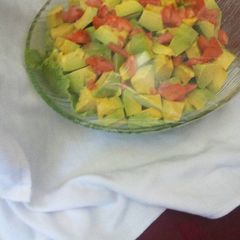 A picture of Tomato and avocado salad.