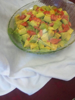 A picture of Tomato and avocado salad.