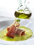 Tomato and rocket stuffed Iberian ham rolls