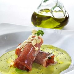 A picture of Tomato and rocket stuffed Iberian ham rolls.