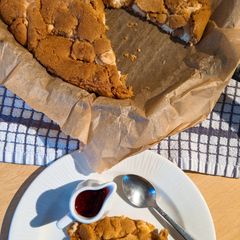 White Chocolate Skillet Cookie & Raspberry Coulis A picture of White Chocolate Skillet Cookie & Raspberry Coulis.
