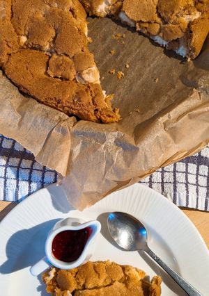 A picture of White Chocolate Skillet Cookie & Raspberry Coulis.