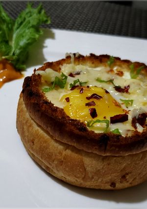 A picture of Cheesy Egg with Baked Bread Bowl.