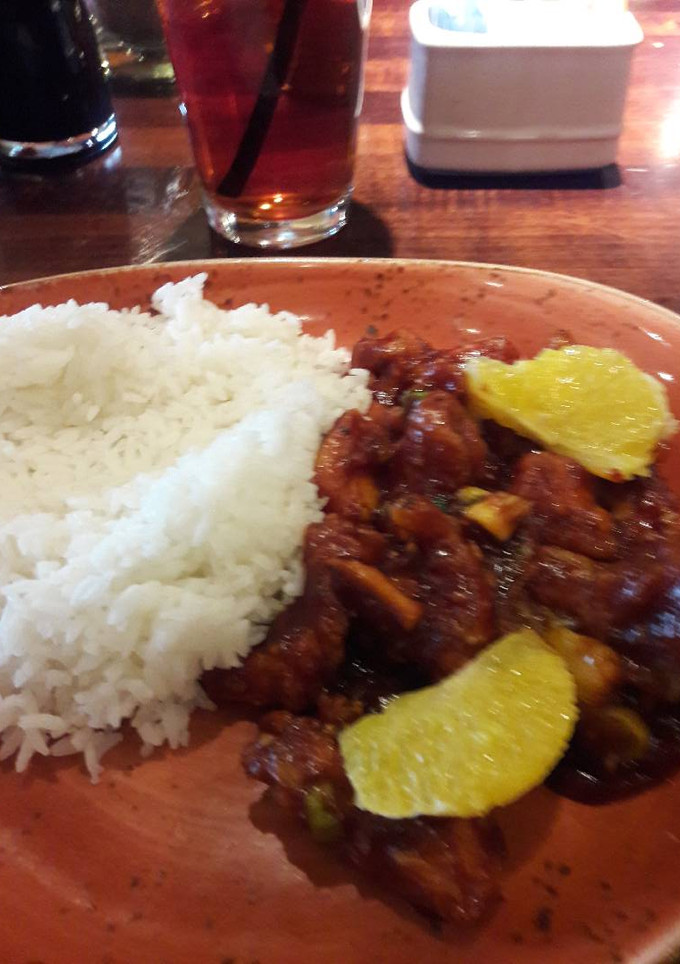 Una foto de Pollo a la naranja a la mexicana