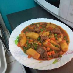A picture of Matoke and beef stew.