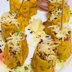 A picture of Stuffed veggie cheese roll.