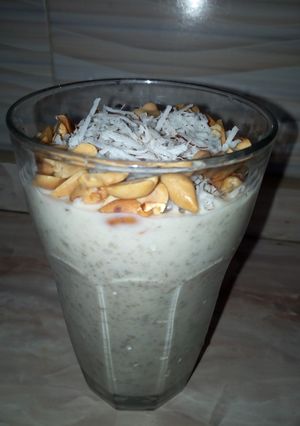 A picture of Yoghurt and fura garnish with coconut and groundnut.