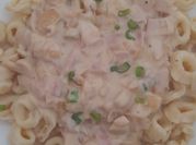 Una foto de champiñones con salsa bechamel