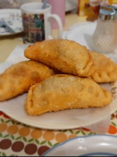 Una foto de Empanadas de pino fritas