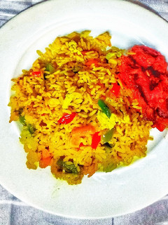 A picture of Fried Rice with Sweet Peppered Chicken.