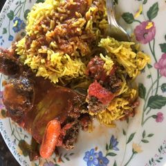 A picture of Kofta with Tomatoes.