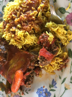 A picture of Kofta with Tomatoes.