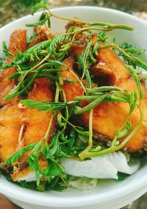A picture of Sour Curry with Fried Tilapia (Gaeng Som Pla Nil Tod).