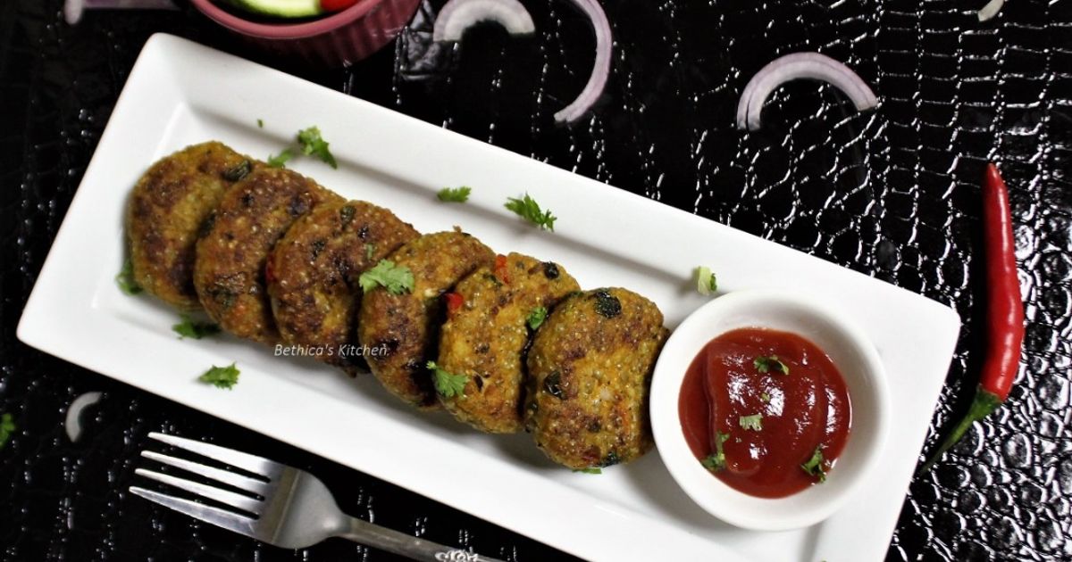 Bajra Tikki, pearl millet patties with spices, golden brown and crispy, served with green chutney