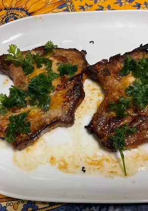 Une photo de Côtes de porc marinées au four
