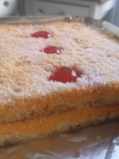 Una foto de Tarta húmeda de zanahoria y sobao pasiego