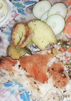 Una foto de Carne de cerdo al horno tambor con papines al romero