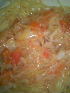 A picture of Fried cabbage and spaghetti.