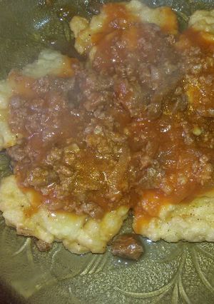 Una foto de Croquetas de arroz con salsa