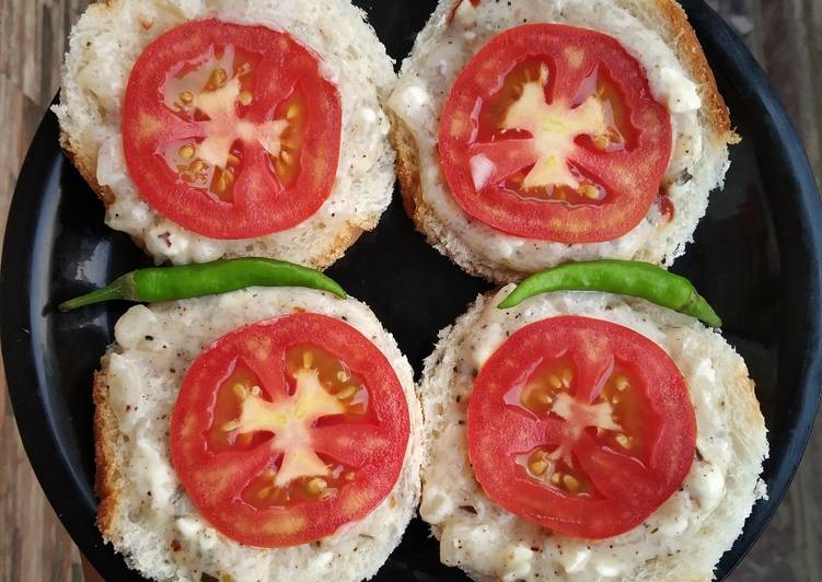 Cheese onion tomato open toastie