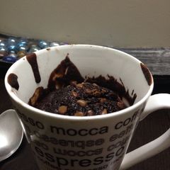 A picture of Eggless Cake in a mug.