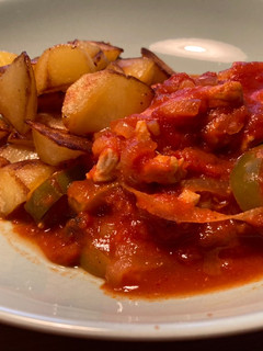 Una foto de “Fritá” de tomates con pavo