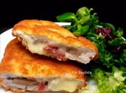 Una foto de escalope con queso