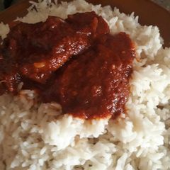 A picture of Rice and stew.
