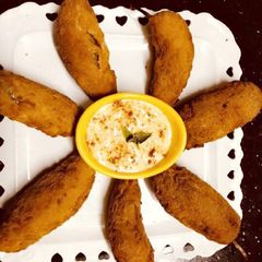 A picture of Peri bites with honey mustard sauce (hot and yummy).
